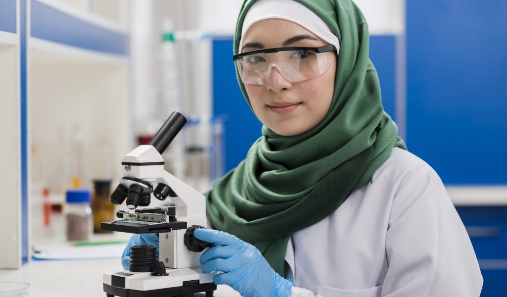 female-scientist-with-hijab-working-lab-with-microscope