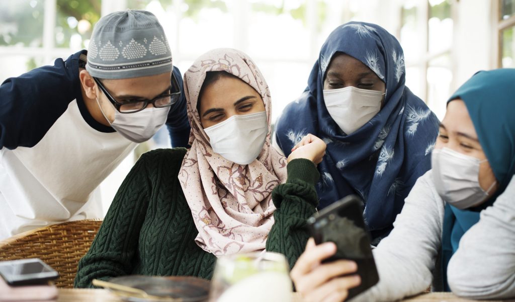Muslim students wearing masks hanging out in the new normal